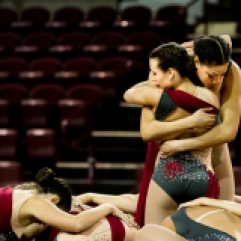 Junior, Miranda Richards (front) and senior, Imani Roberts (back) hug for the final pose during the Central Michigan University Dance Team's nationals showcase in MaGuirk Arena, Sunday, April 8, 2018.
